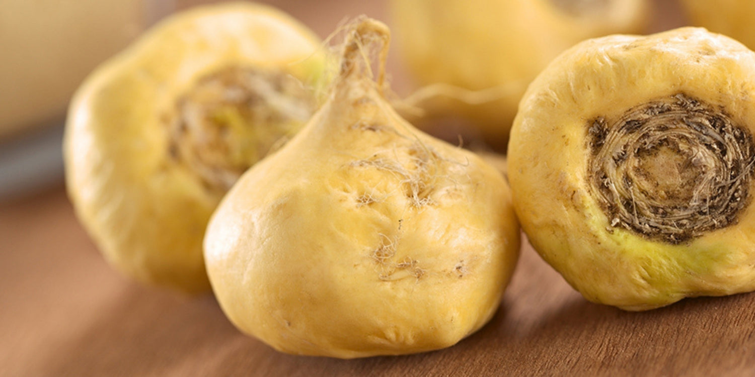 Maca root on a wooden table
