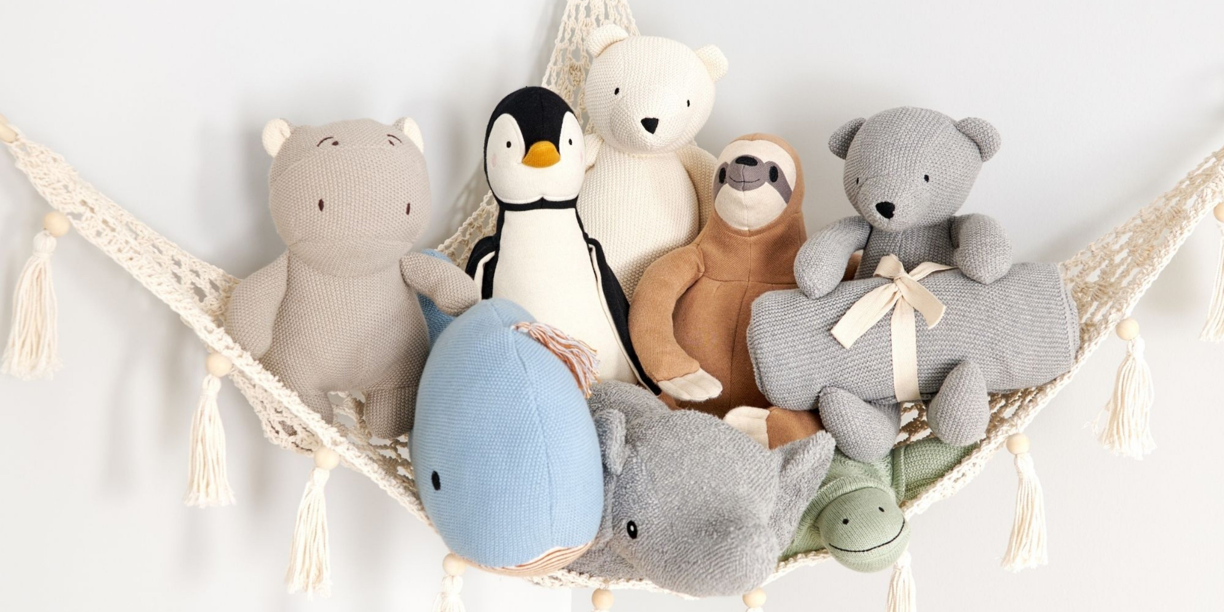 Naturepedic organic stuffed animals in a hammock