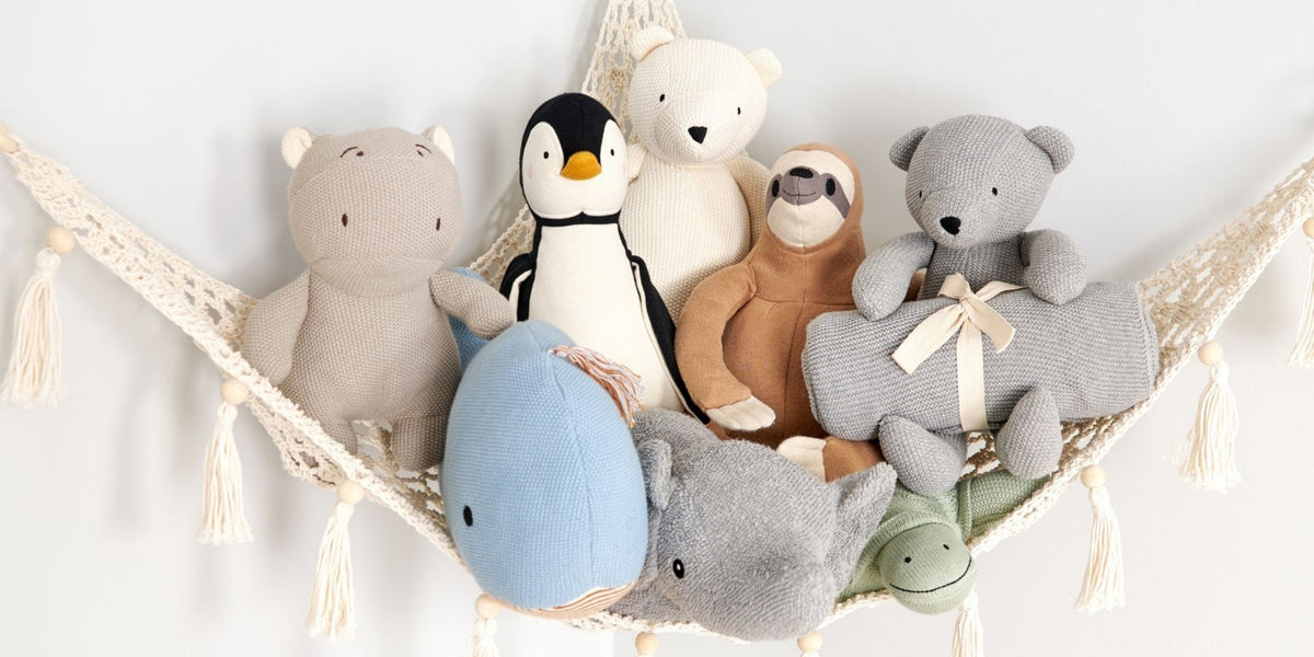 Naturepedic stuffed animals in a hammock