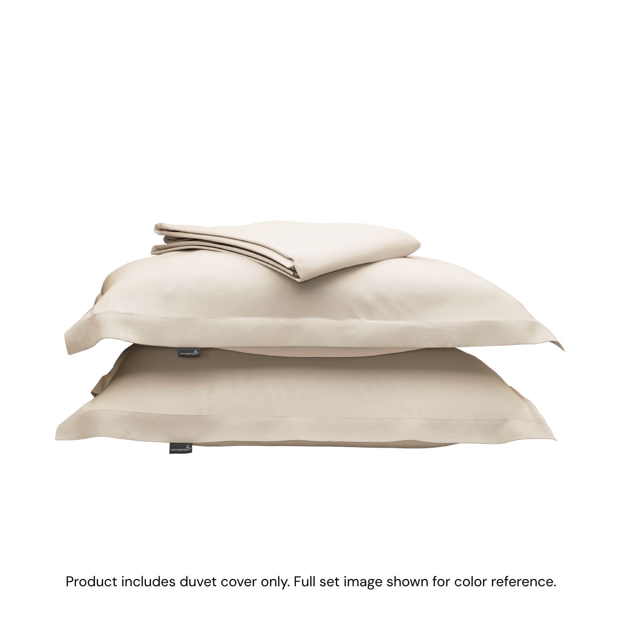 A folded duvet cover sitting on top of two pillow shams #color_cream