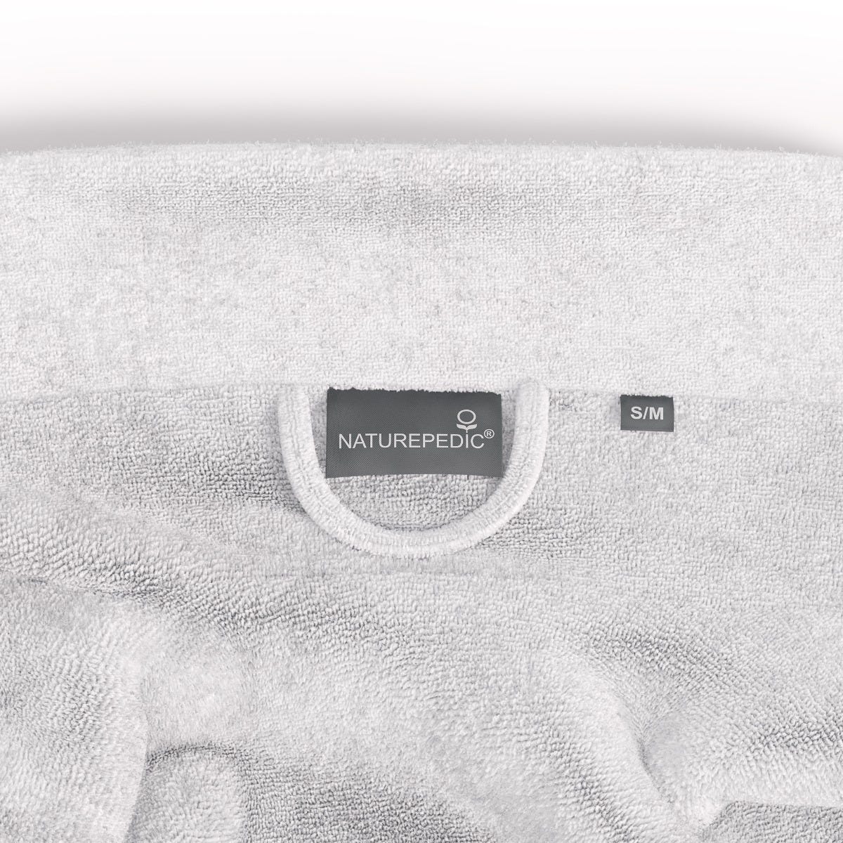 White robe with Naturepedic label on a white background #color_arctic snow
