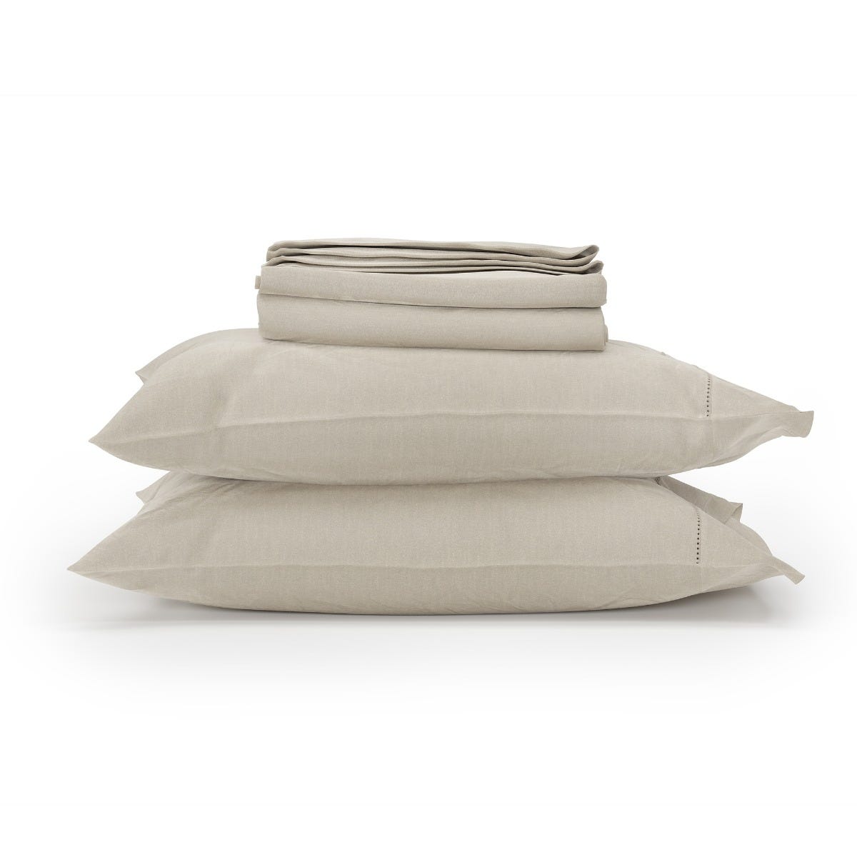 Beige bed sheets and pillowcases set on a white background #color_undyed