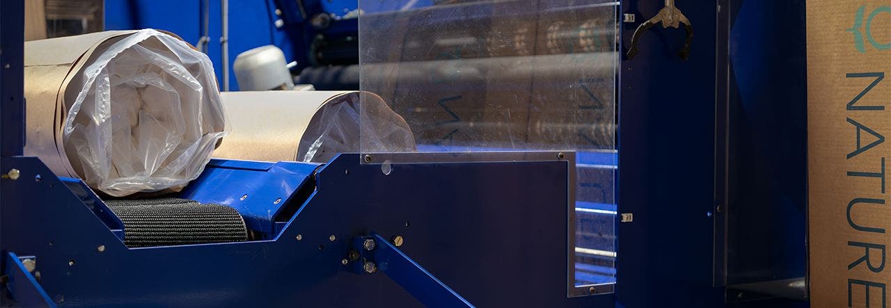 Mattress exiting the kraft paper roll-packing machine