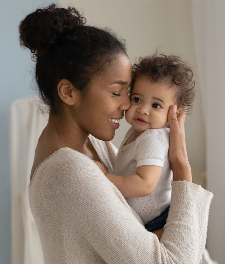 woman holding a child