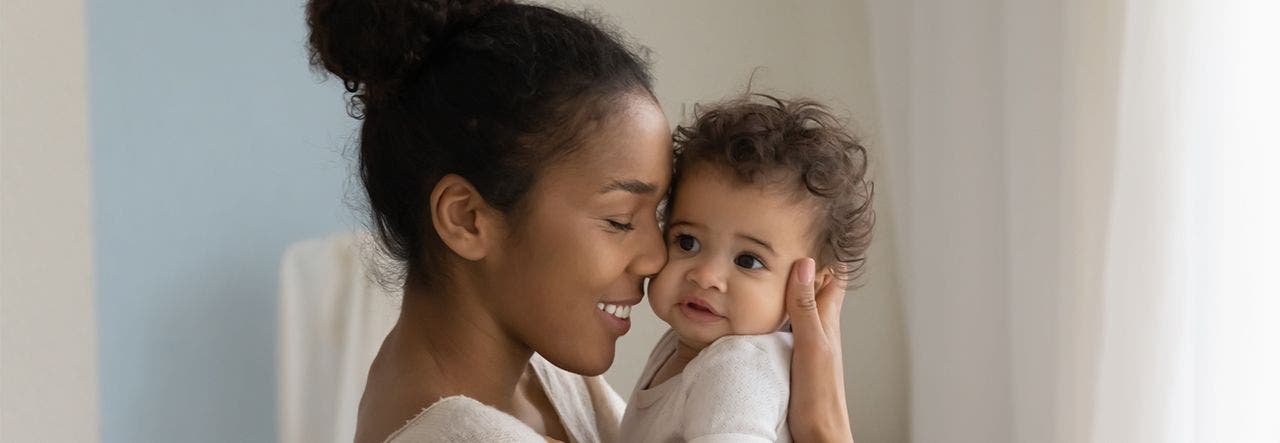 woman holding a child