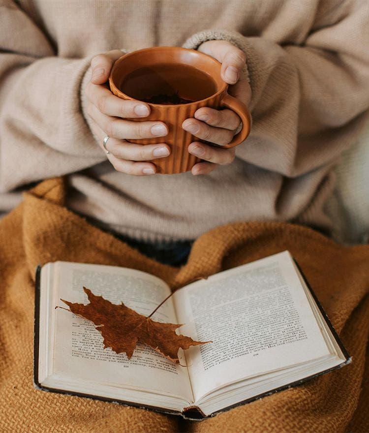 Hands holding cup of coffee 