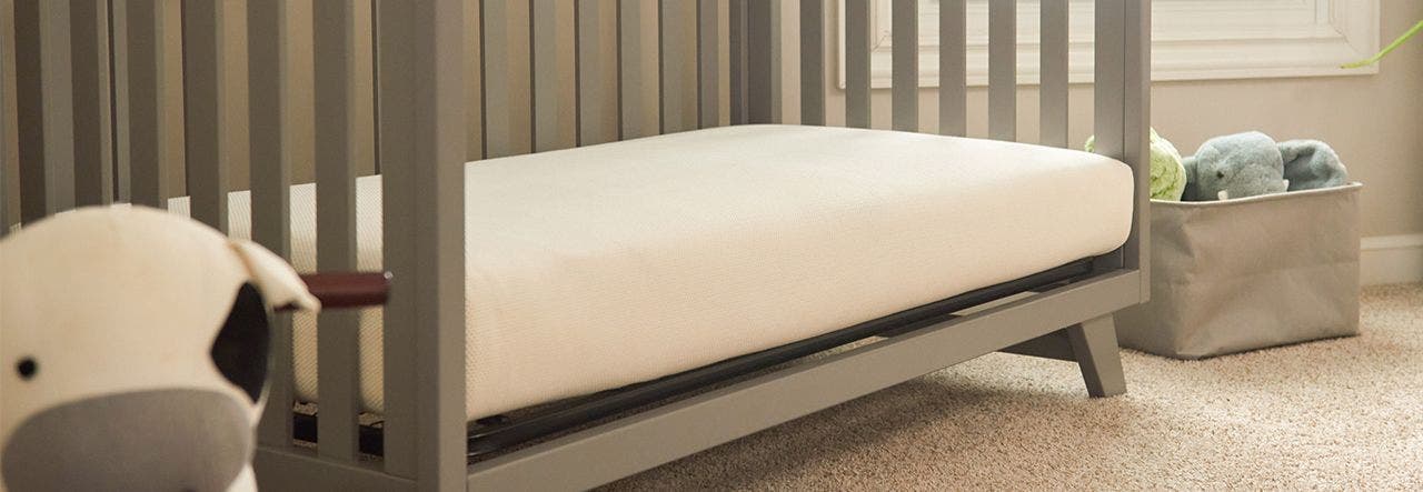 nursery with crib and breathable crib mattress