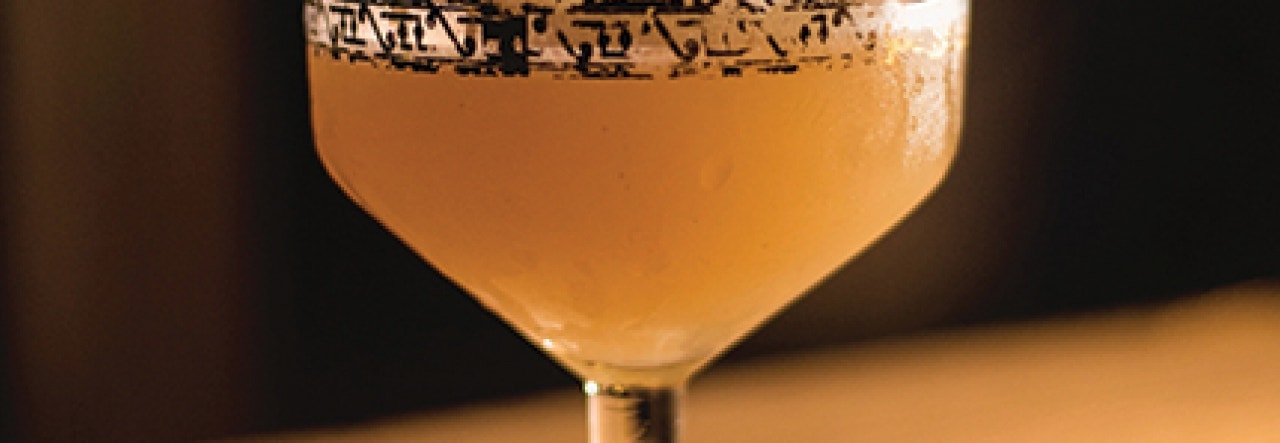 cocktail with green garnish