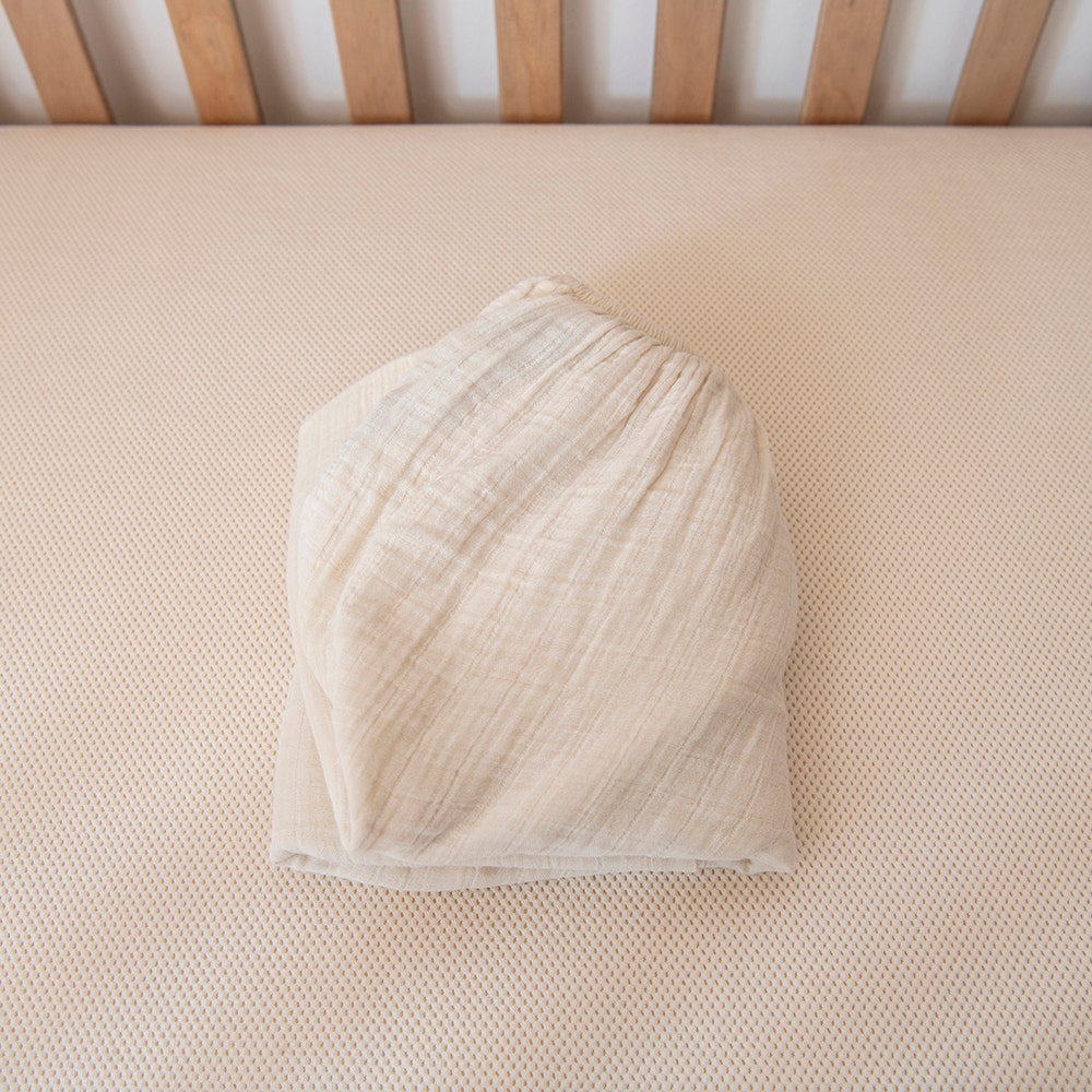Cream crib sheets shop