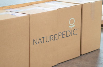 Brown shipping box with Naturepedic label