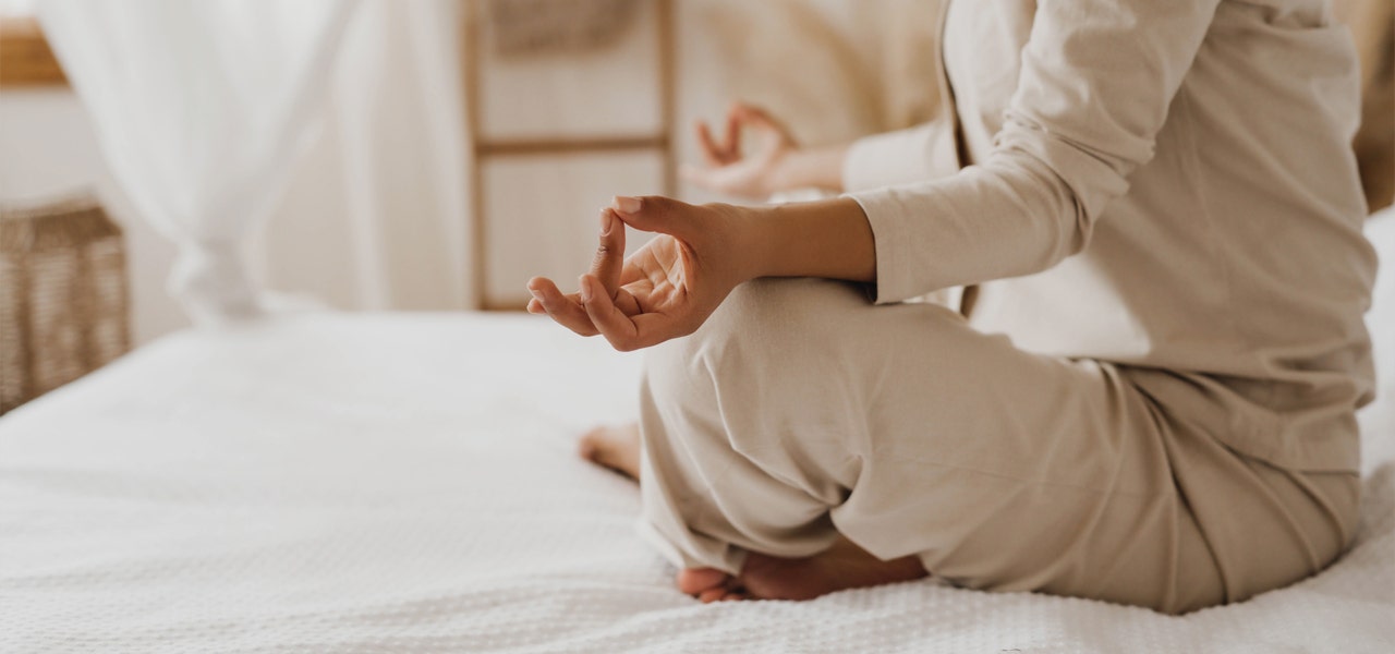 Cropped image of a woman meditating 