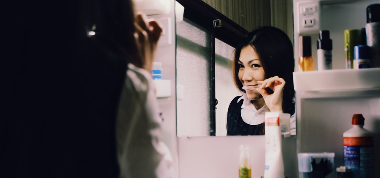 Adolescent girl getting ready for school on the morning