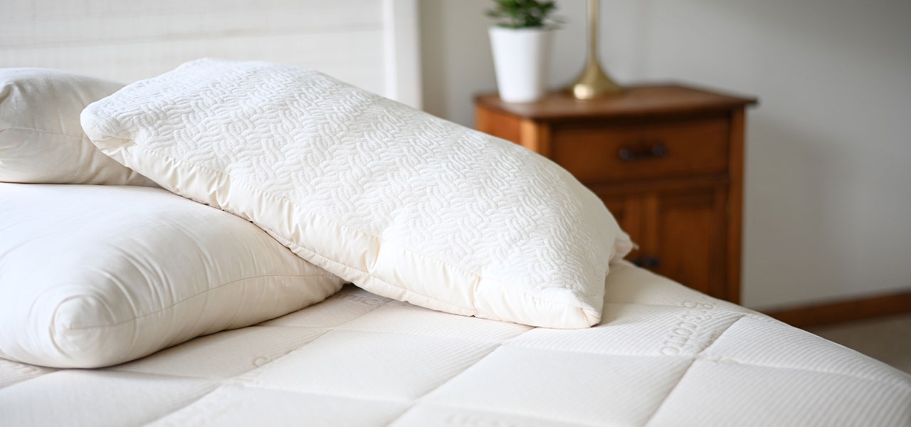 Naturepedic organic latex pillows on an organic mattress