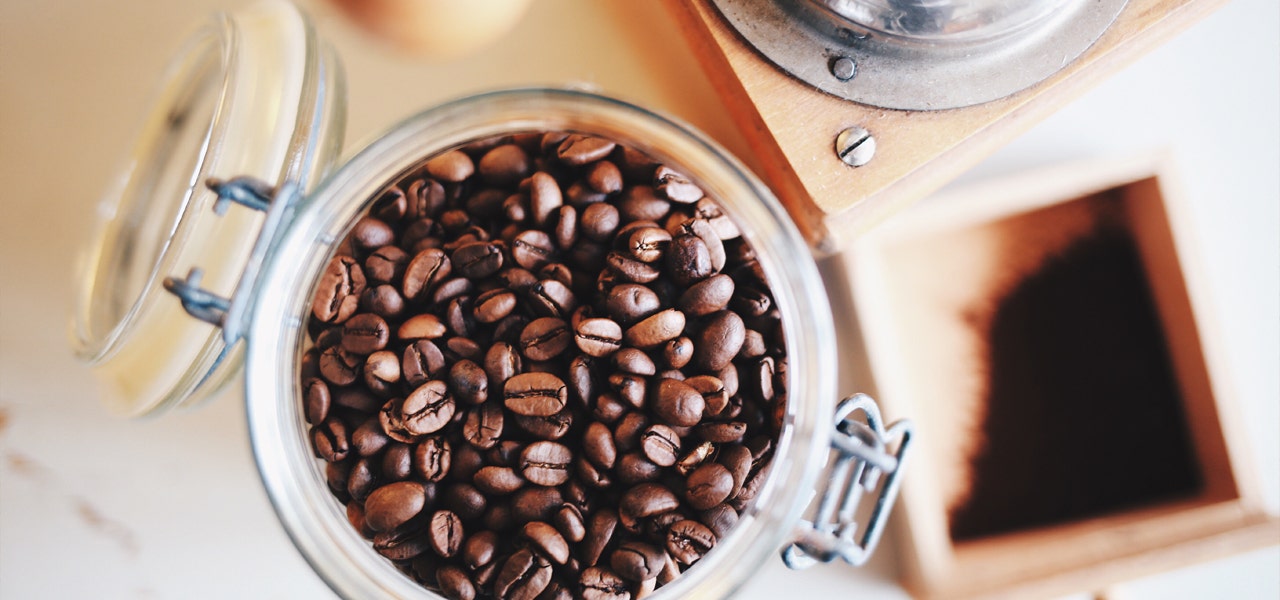 Coffe beans in a glass mason jar