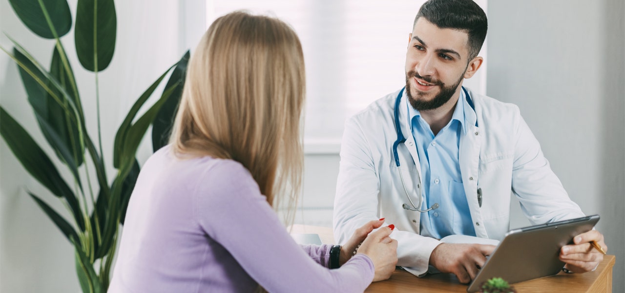 Woman consulting with a doctor about cancer prevention