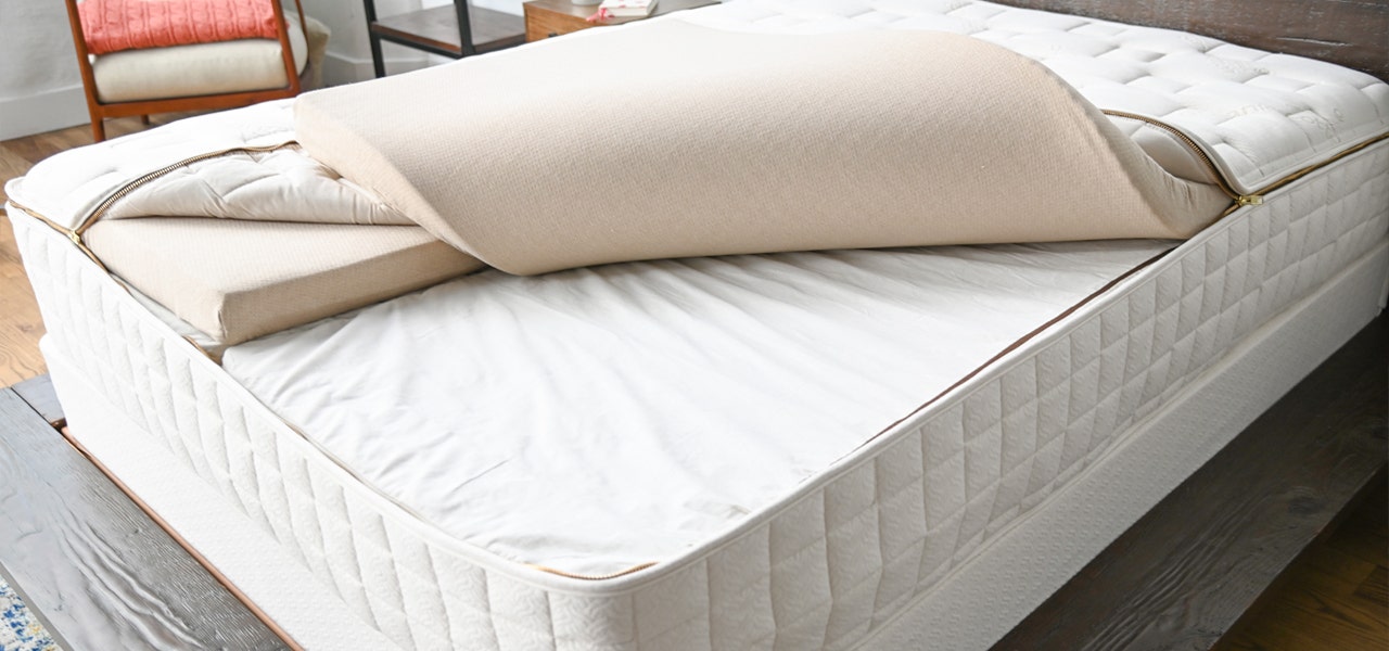 EOS customizable organic mattress unzipped to show latex comfort layers