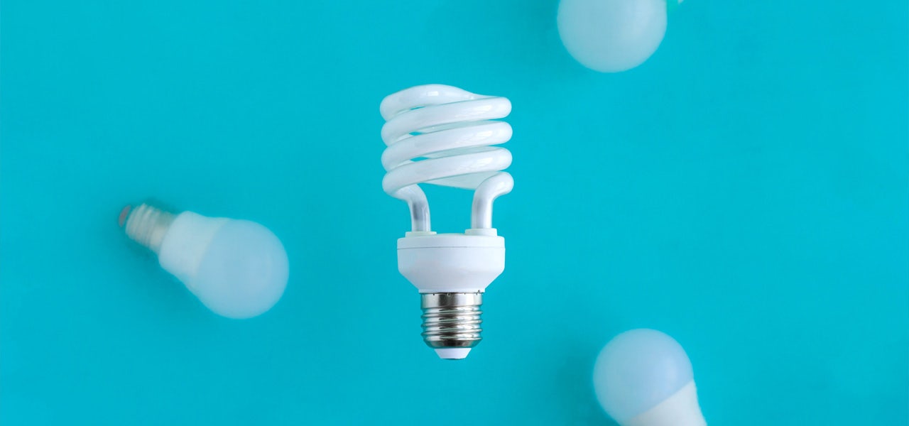 Energy-efficient lighbulb on a blue background