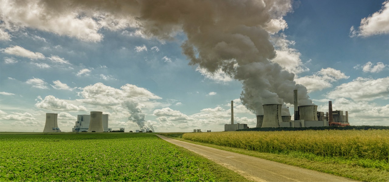 Factory smokestacks emitting questionable VOCs into the air