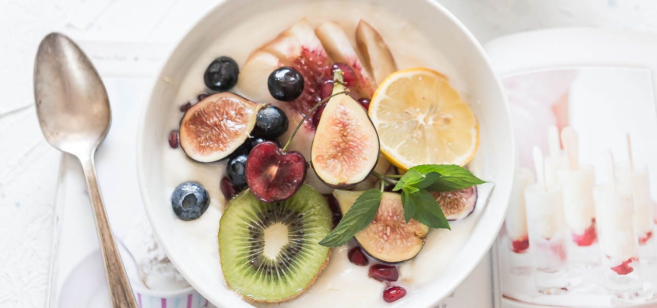 Healthy snack of fresh fruit and yogurt