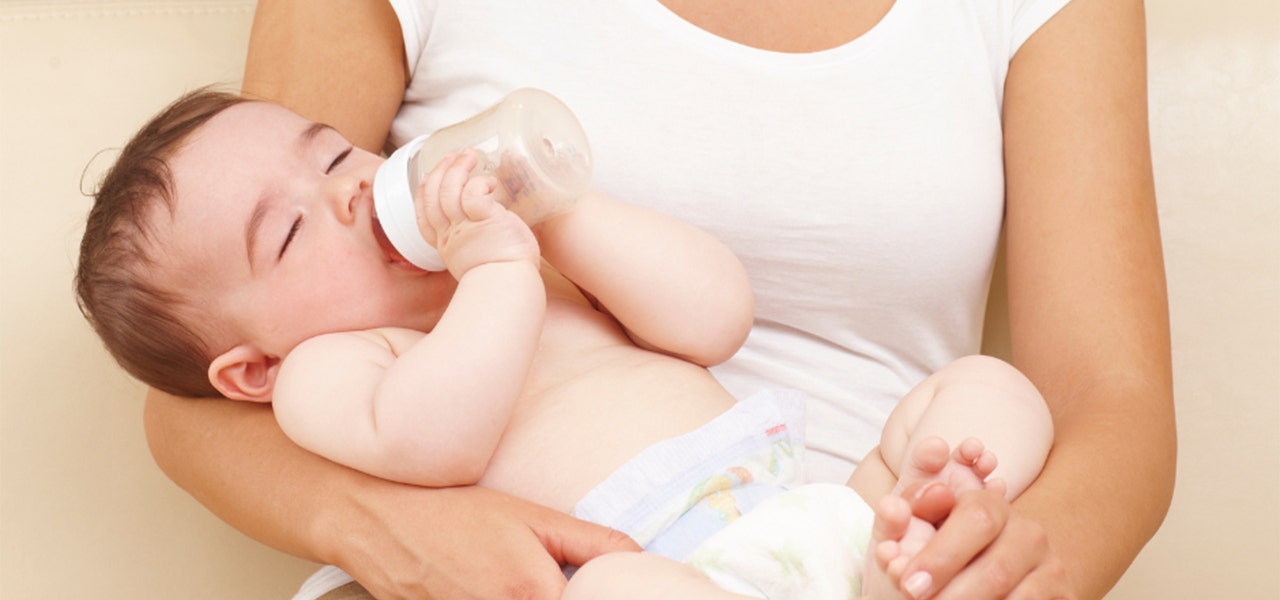 Baby falling asleep while drinking a bottle