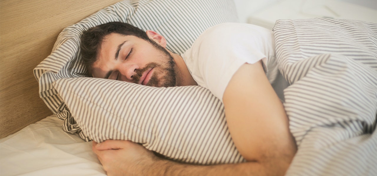 Man sleeping soundly during that day time