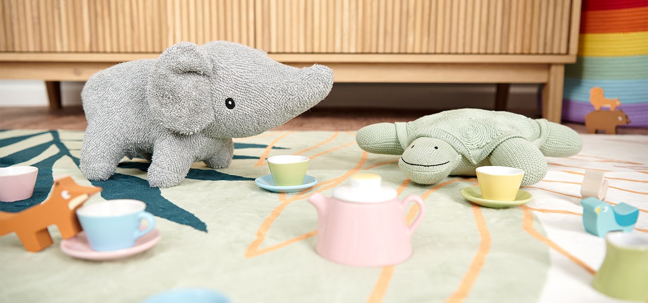 naturepedic organic stuffed animals having a tea party