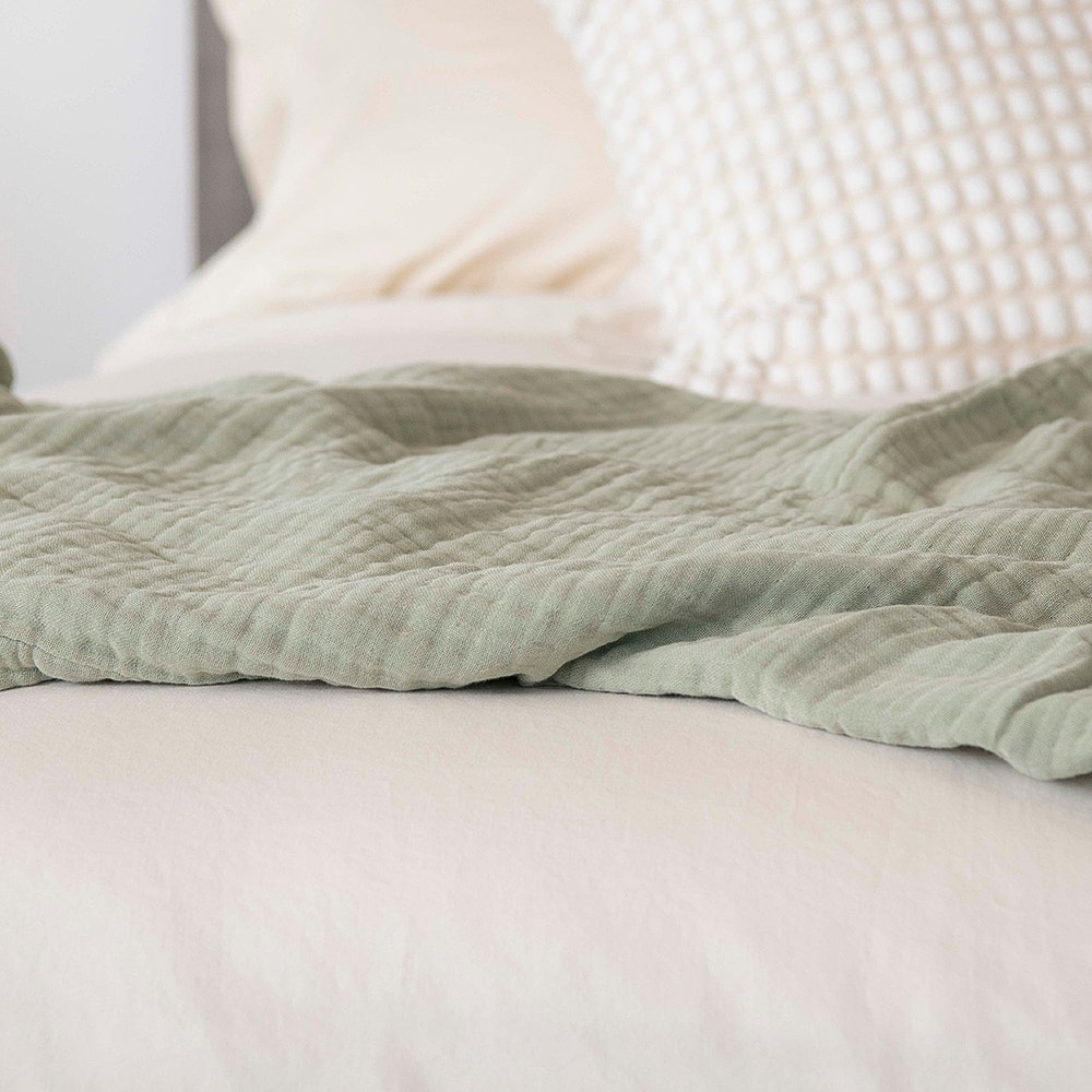 Muslin blanket stack in Forest Canopy color
