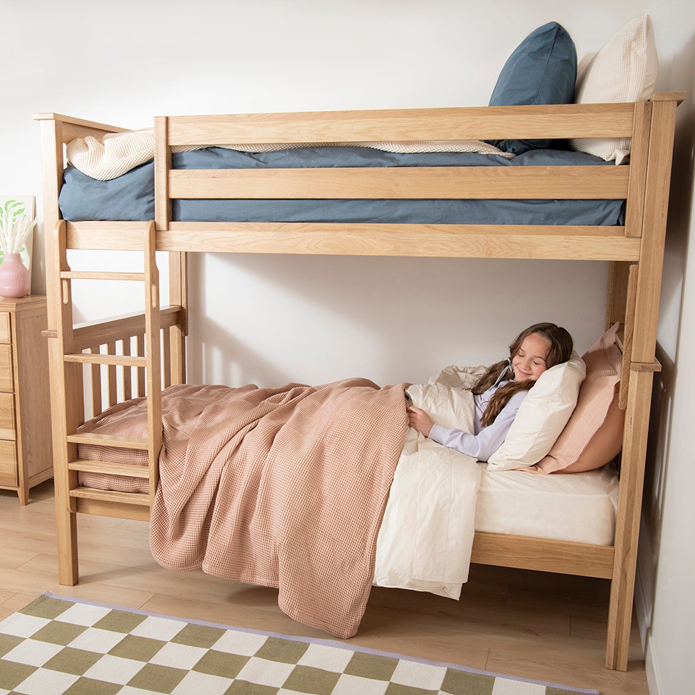 Child in bunk bed